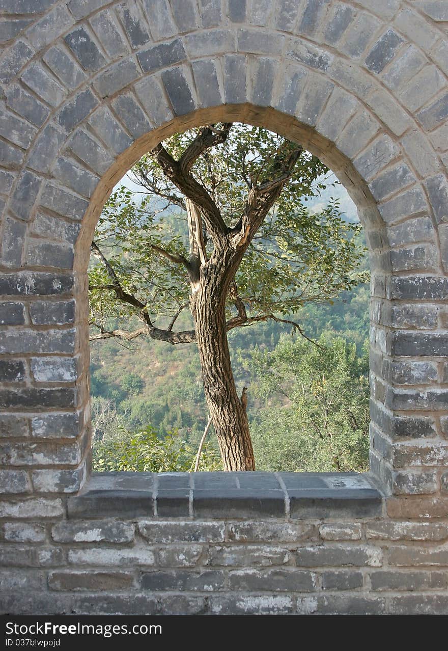 Archway of the Great wall in China with a Tree framed in the archway. Archway of the Great wall in China with a Tree framed in the archway.