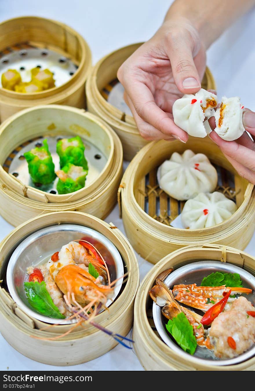 Steamed dumpling and dimsum with hand