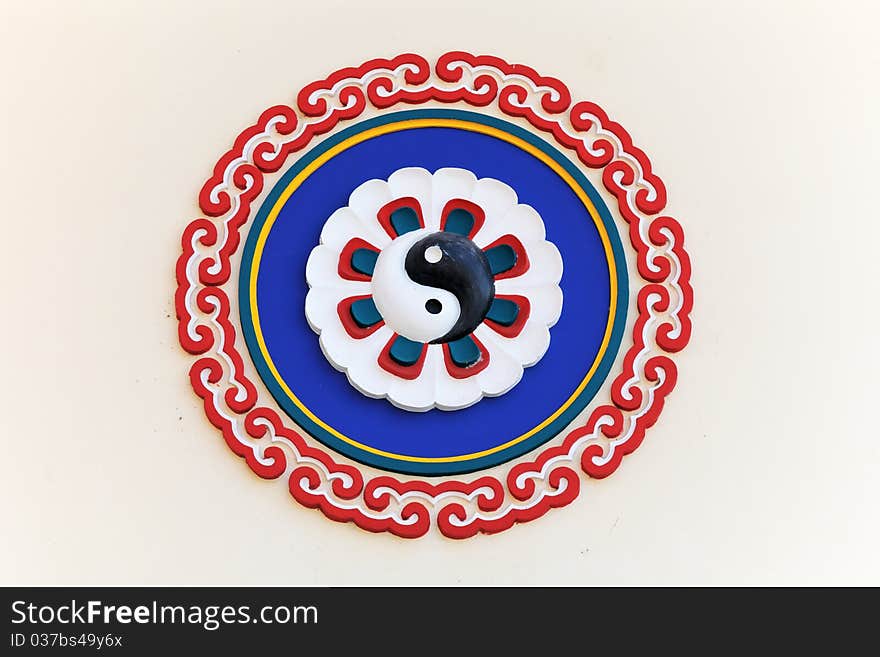 A colorful yin-yang sign in the chinese temple