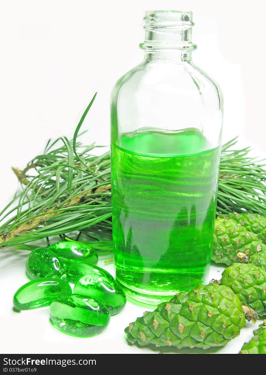 Spa green oil bottle with fir natural coniferous extract. Spa green oil bottle with fir natural coniferous extract