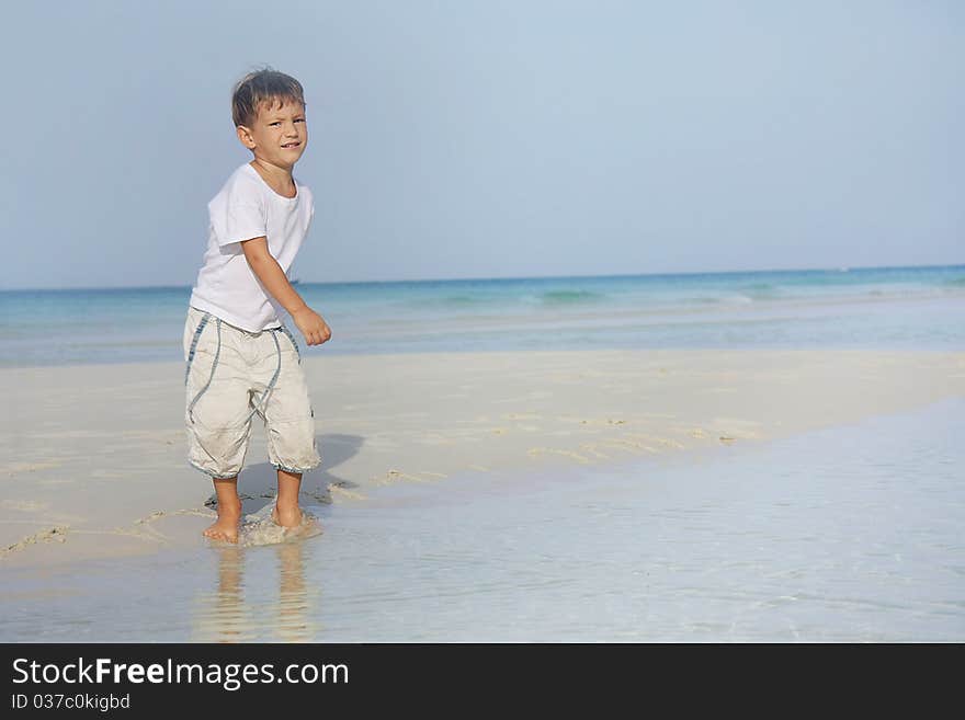 Cute boy on sand beach. Cute boy on sand beach