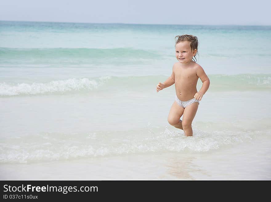 Cute child playing on beach. Cute child playing on beach