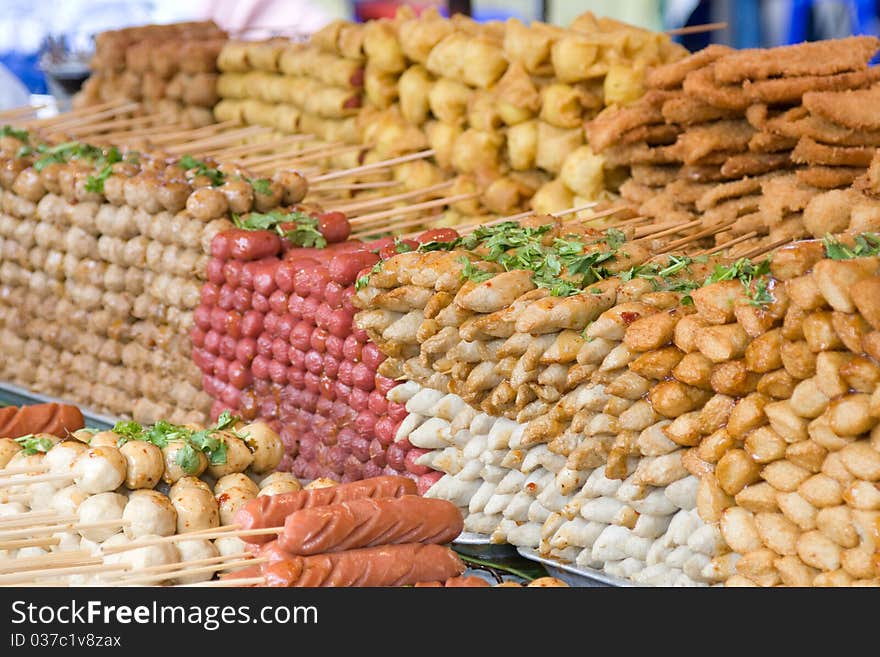 Asian snack displaying on the tray at Bangkok night market. Asian snack displaying on the tray at Bangkok night market