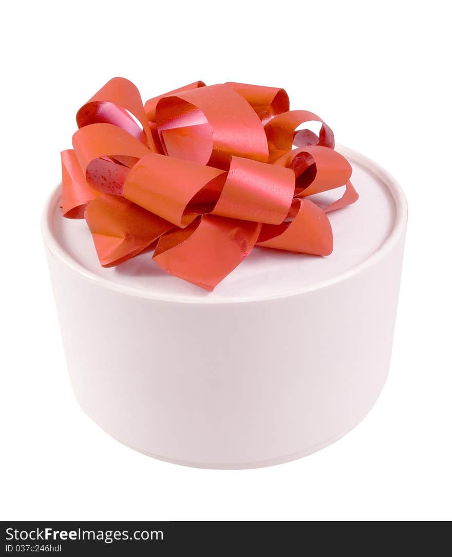 Round white gift box with a red bow