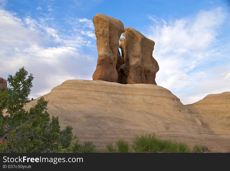 Hoodoos on a natural pedestal, Devil's Garden, Grand Staircase Escalante National Monument, Utah