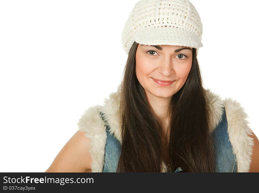 Closeup portrait of young female in knitted cap