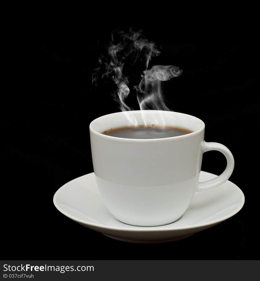 White cup with white smoke isolated on black background. White cup with white smoke isolated on black background