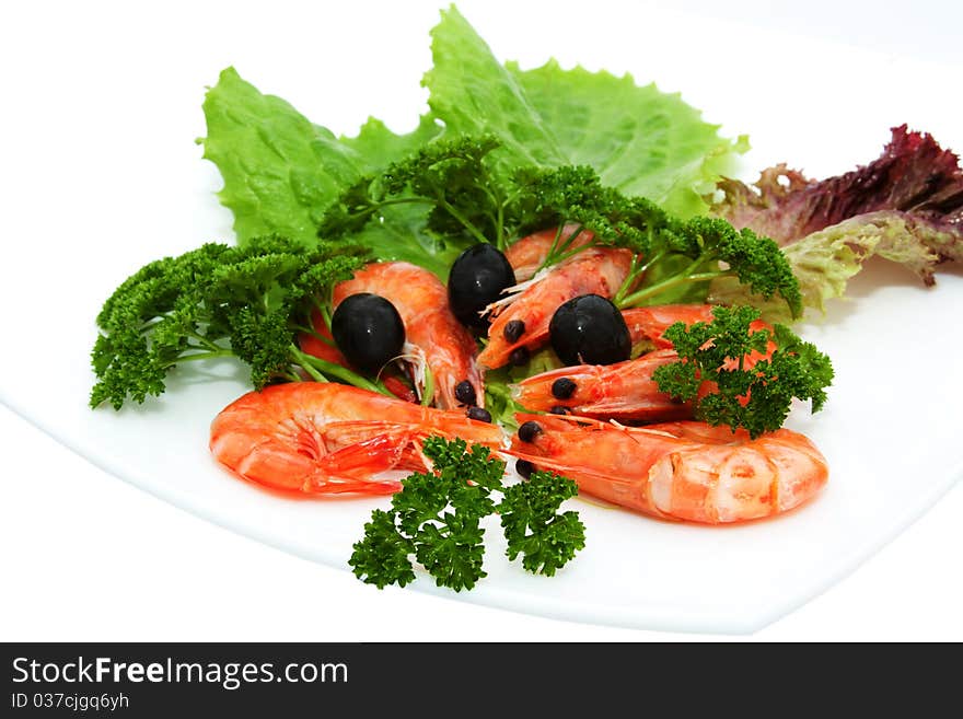 Shrimp with lettuce, parsley and black olives. Shrimp with lettuce, parsley and black olives