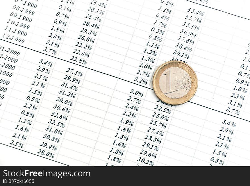 Business diagram on financial report with coins