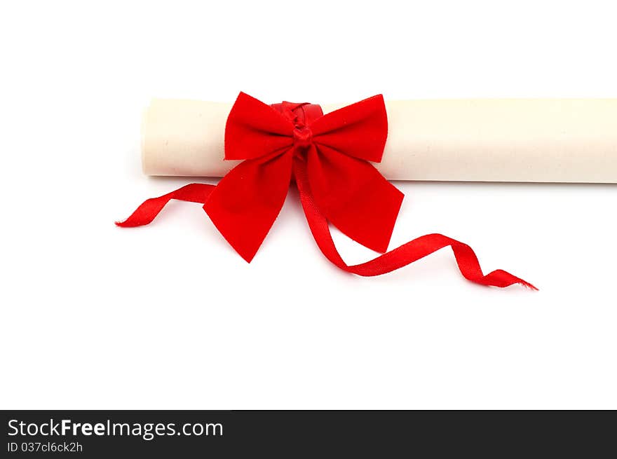 Diploma with red ribbon on white background