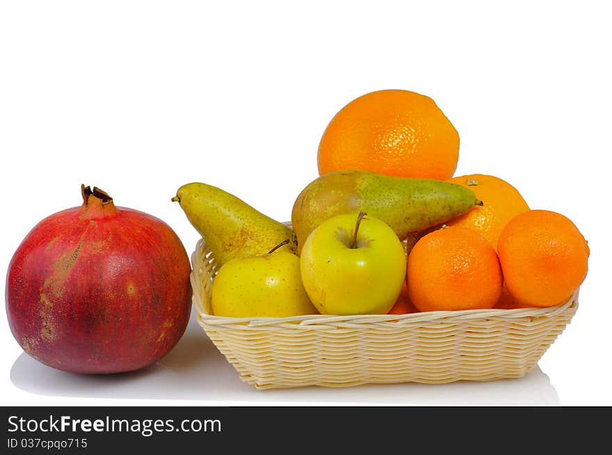 Fresh tropical fruits isolated on white background