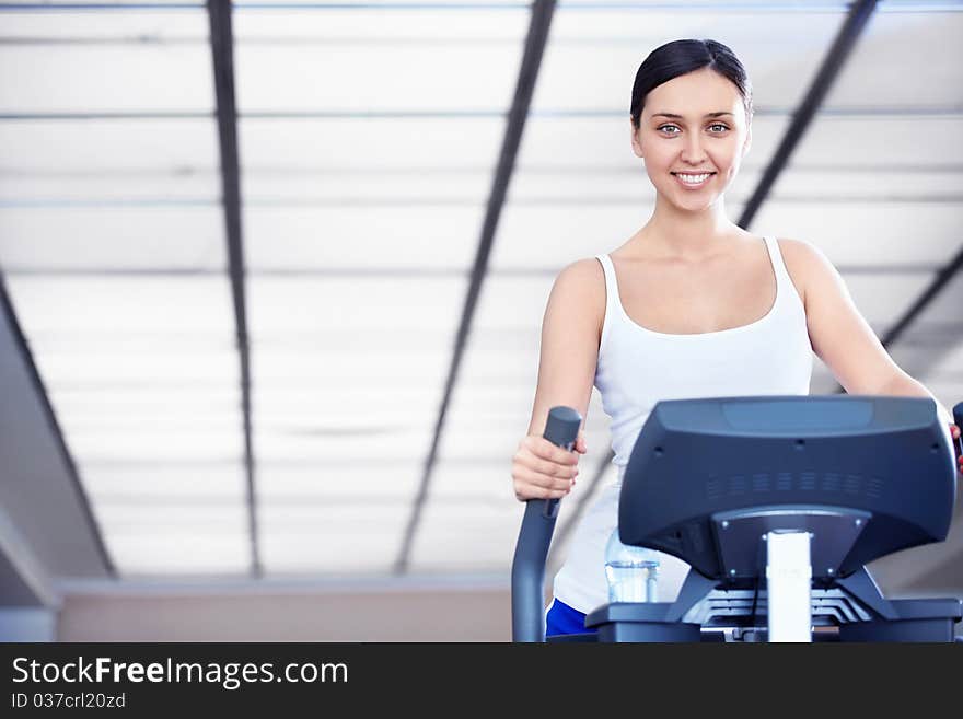 A young attractive girl engaged in fitness. A young attractive girl engaged in fitness