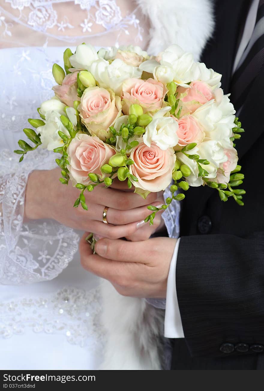 Hands with holding flower bouquet. Hands with holding flower bouquet