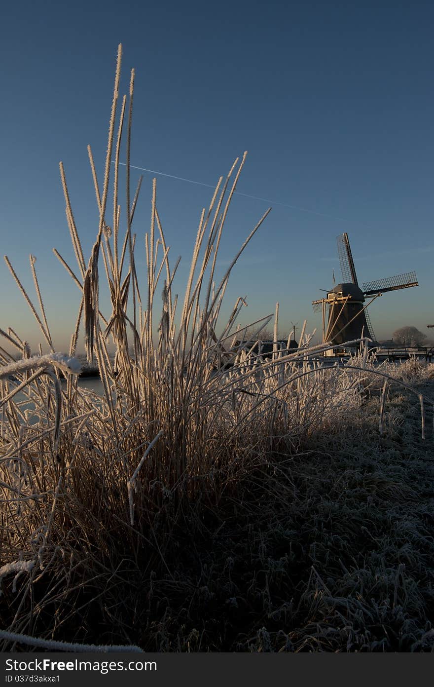 Old Windmill along frozen river