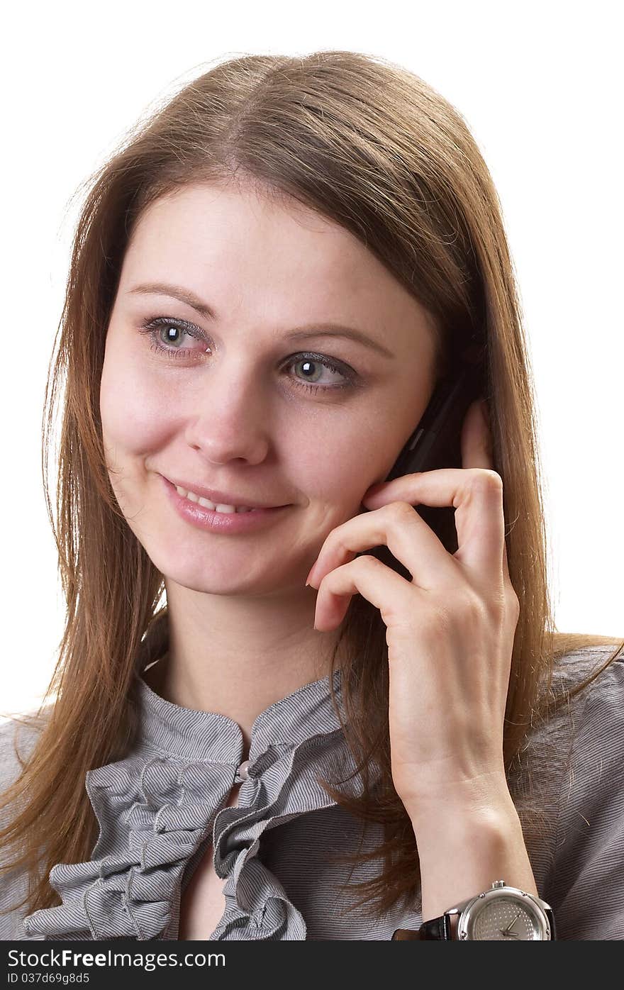 Young adult woman on call with a cell phone portrait