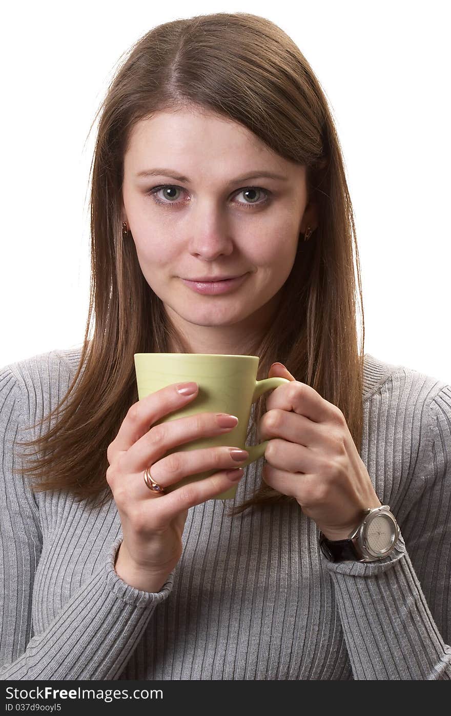 Young woman with green cup in the hands isolated over white background. Young woman with green cup in the hands isolated over white background