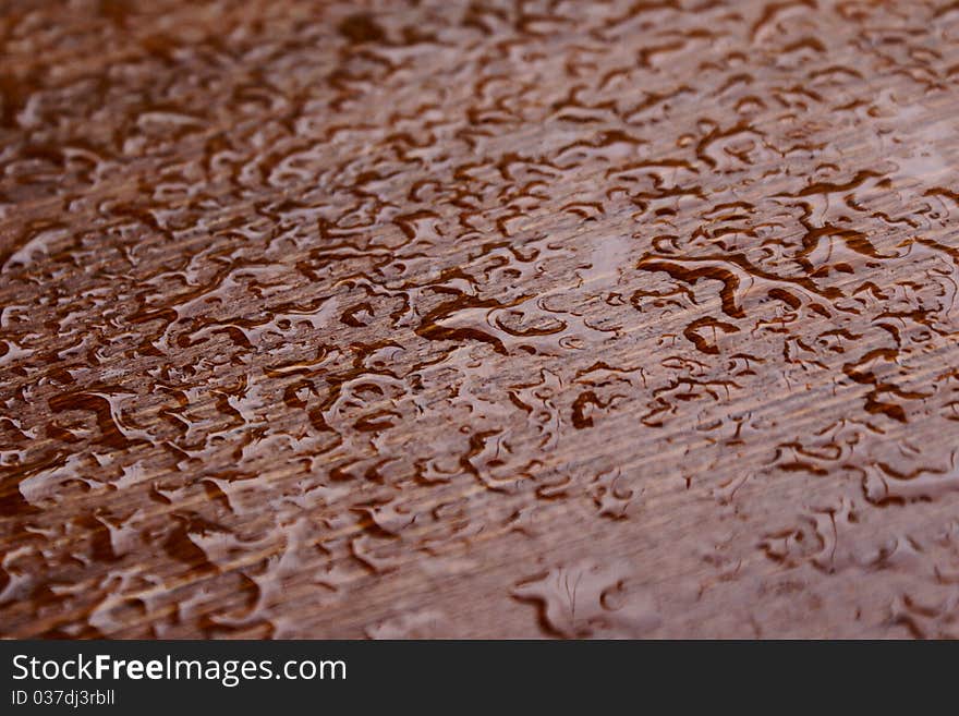 Water Drops On Wooden Surface