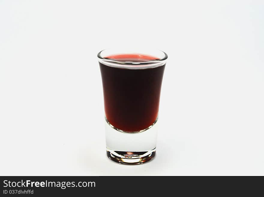 Glass of red wine isolated on a white background