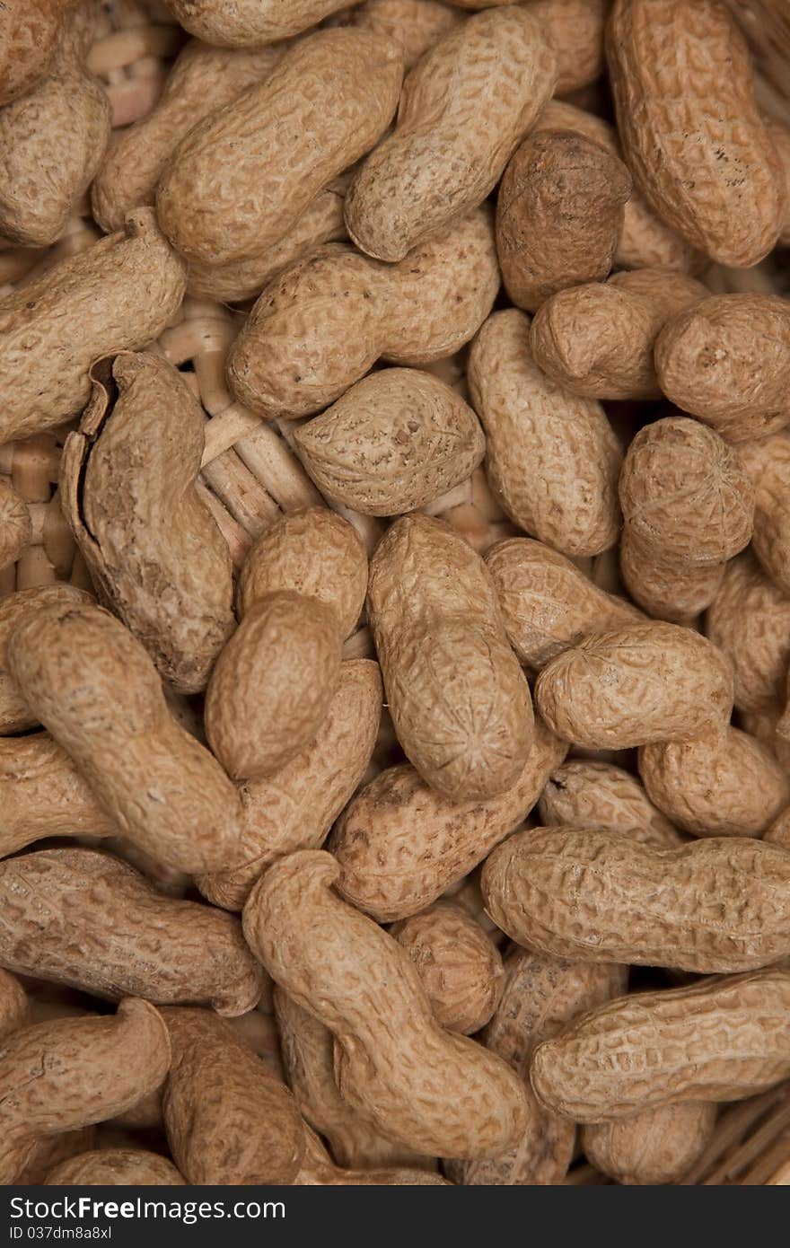 Close-up photo of peanuts in basket