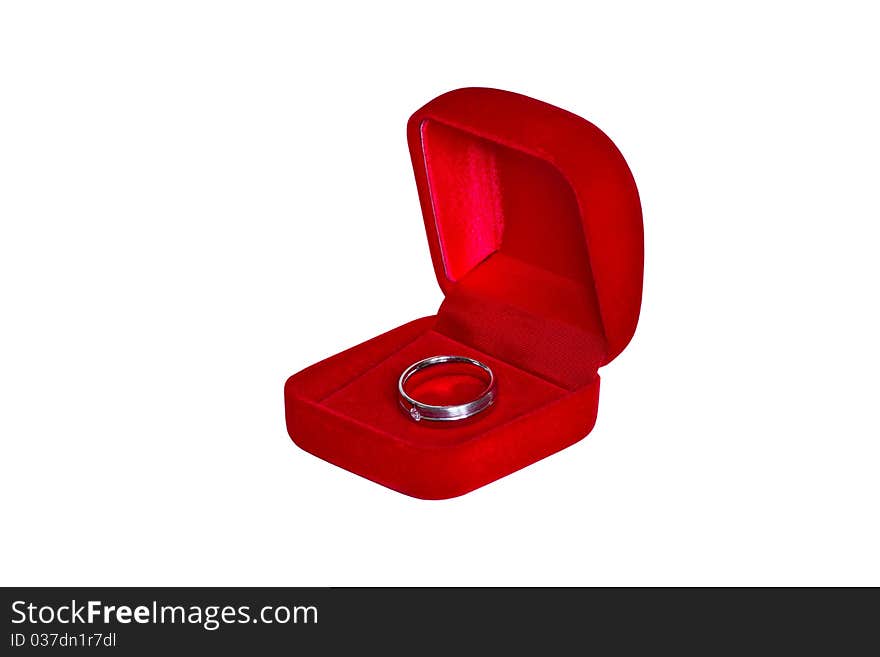 Ring in open red velvet box isolated on white