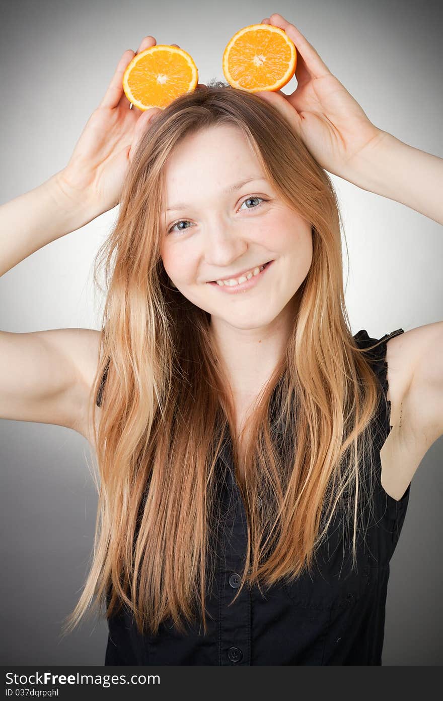 Beautiful young woman has orange ears