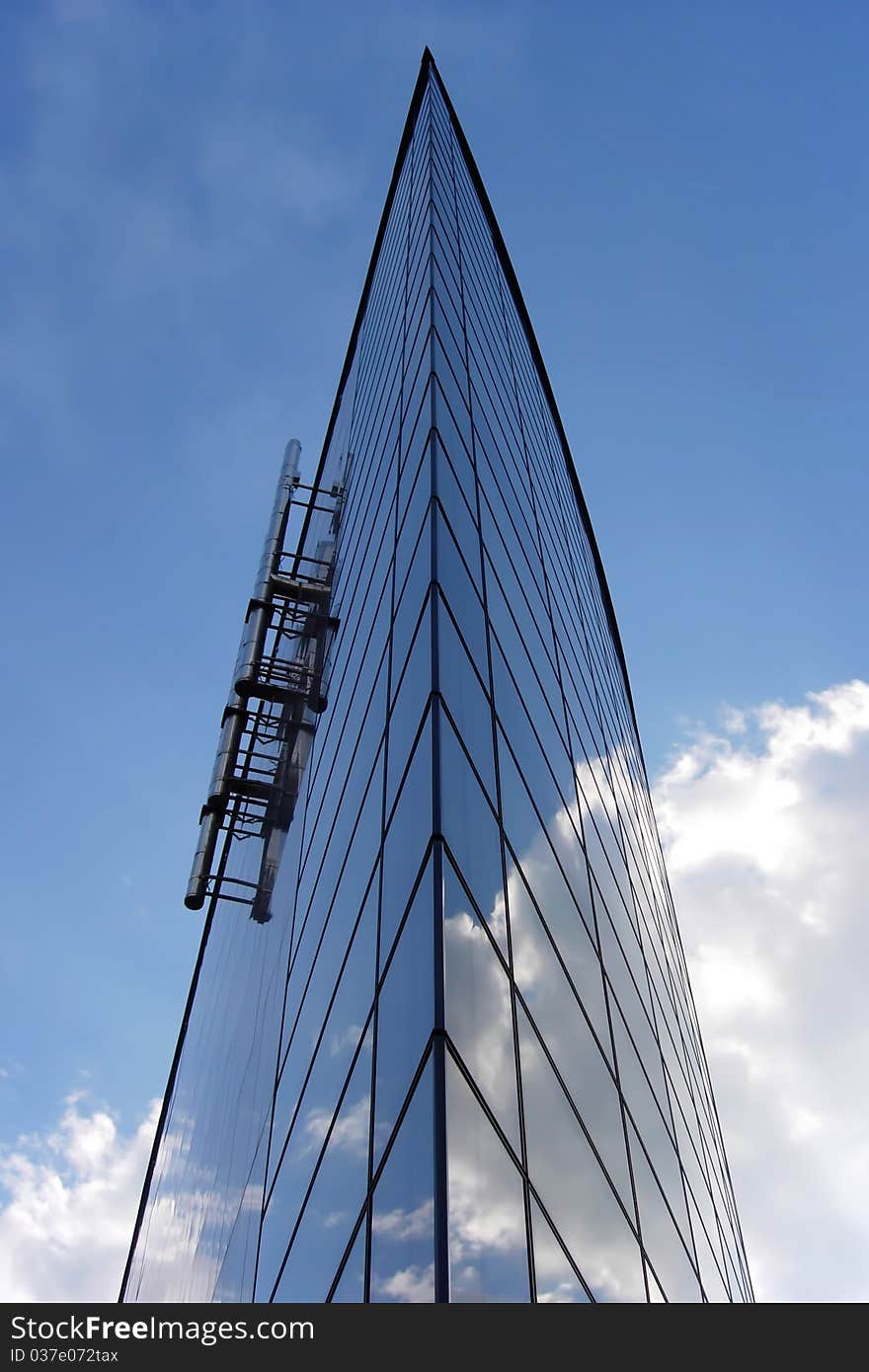 Glass building in the clouds