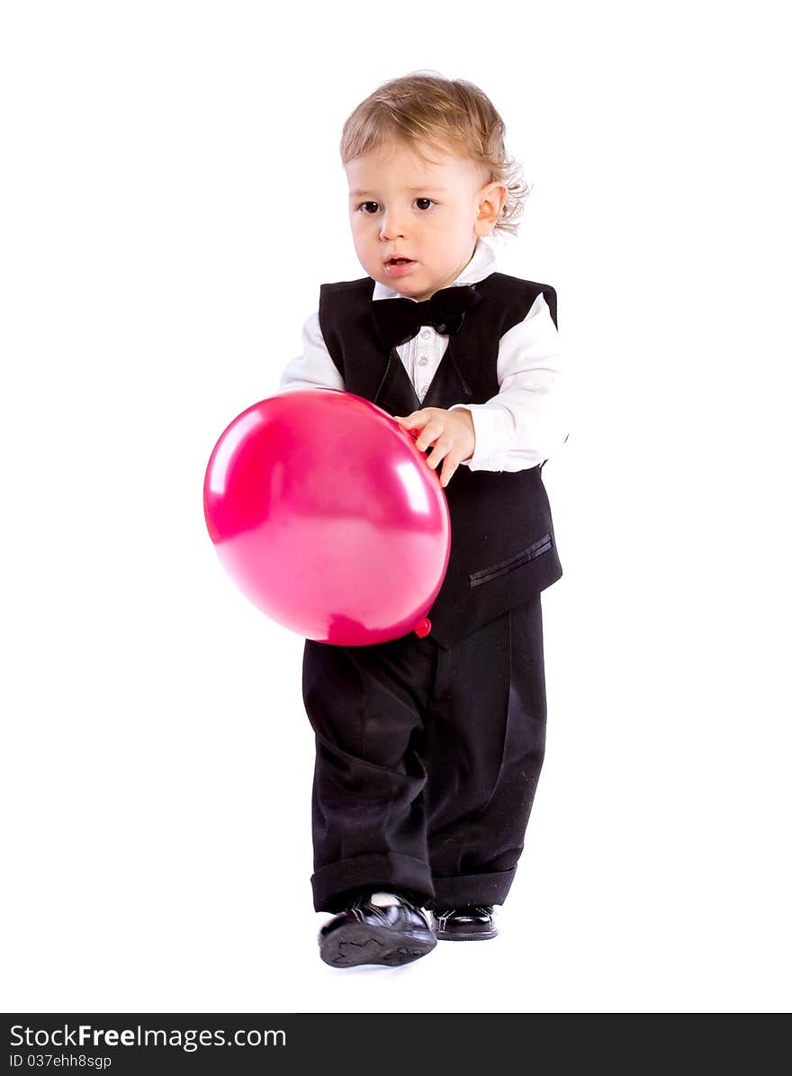 Baby boy in age one year holding balloon isolated