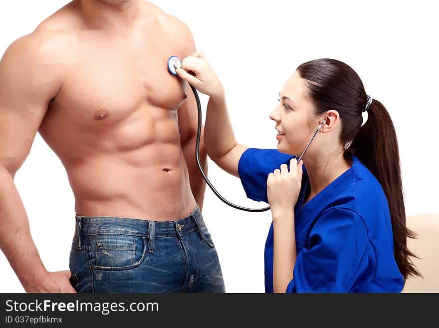 Doctors in uniform stay on white isolated background. Doctors in uniform stay on white isolated background