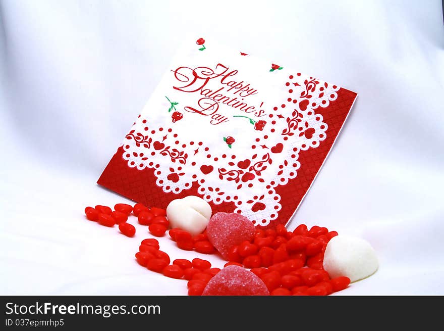 Happy Valentines greetings with red and white candy