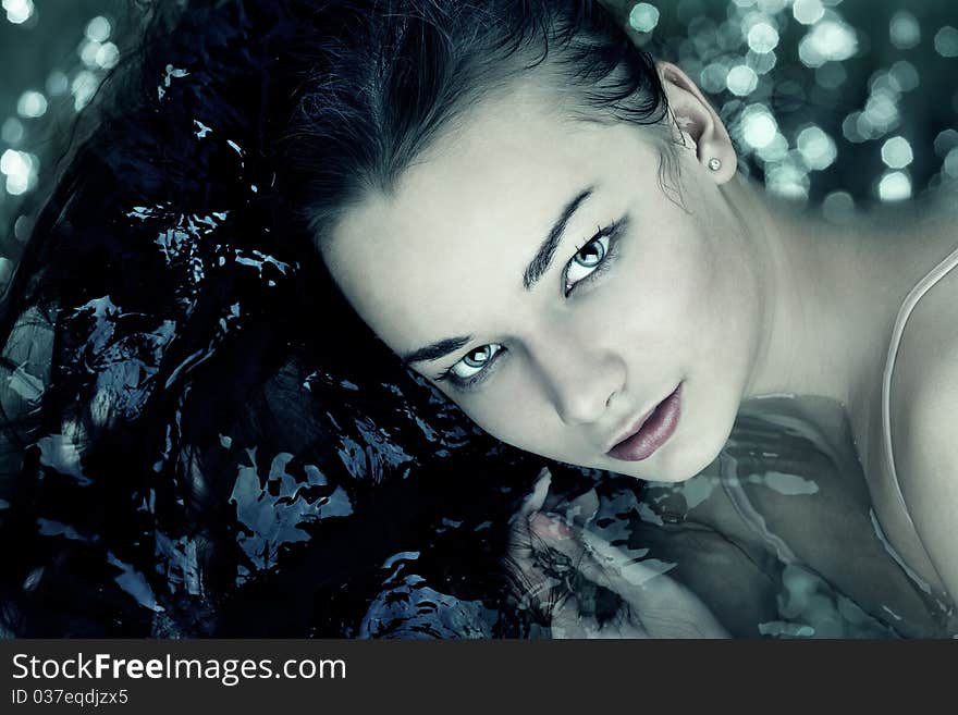 Woman portrait swimming in water close up. Woman portrait swimming in water close up