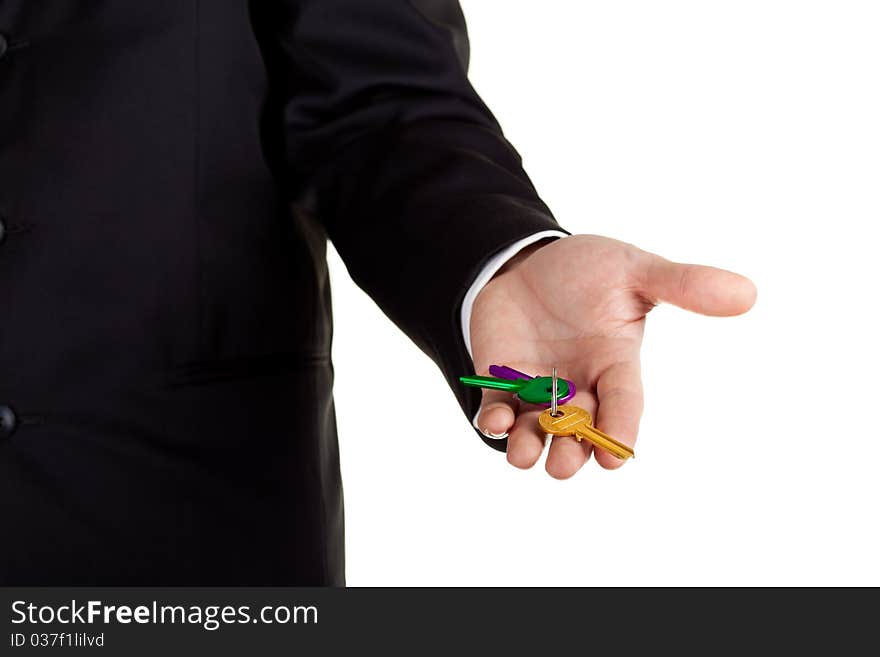 Businessman holding keys isolated on white. Businessman holding keys isolated on white