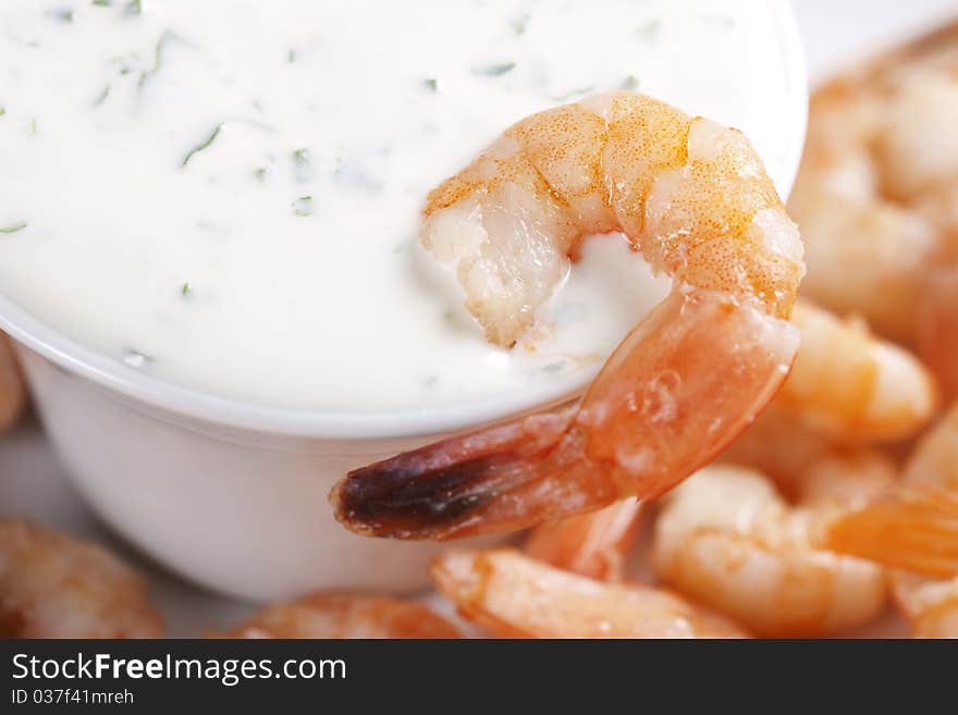 Fried shrimps on a plate and sauce