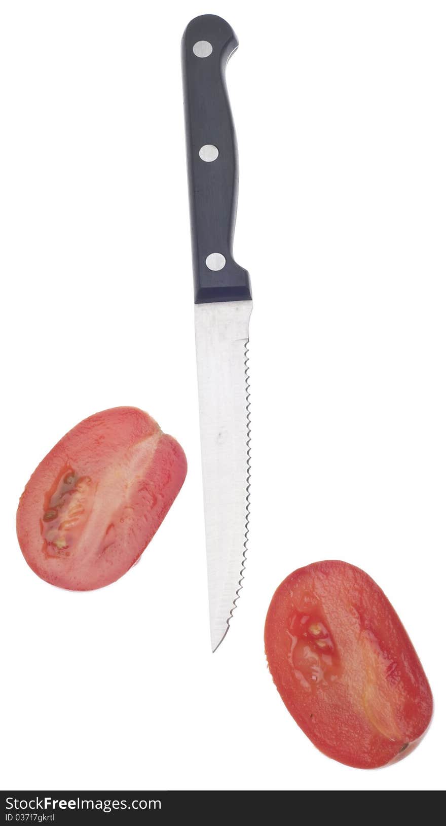 Sliced Roma Tomato with Knife