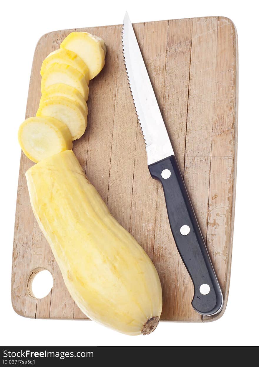 Sliced Yellow Squash on a Wooden Chopping Block