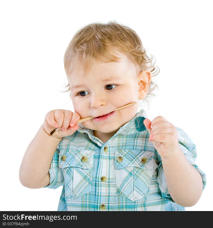 Beautiful baby with paint brush. Isolated.