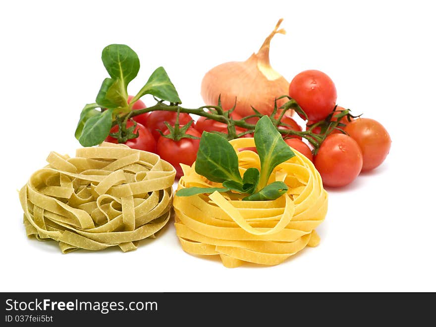 Italian pasta tagliatelle with vegetables on a white background