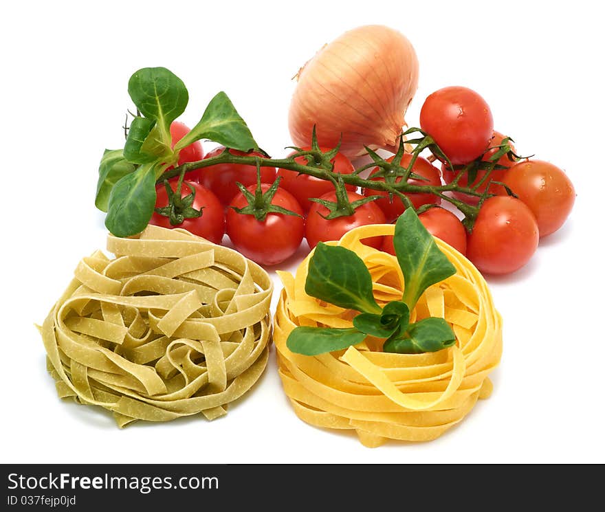 Italian pasta tagliatelle with vegetables on a white background