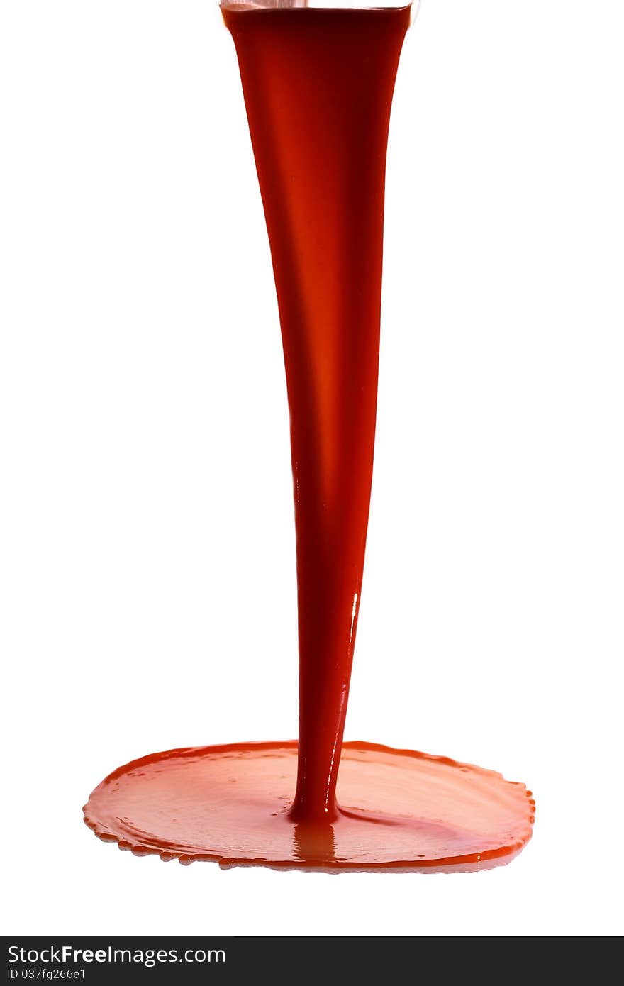 Tomato juice splash in glass white background