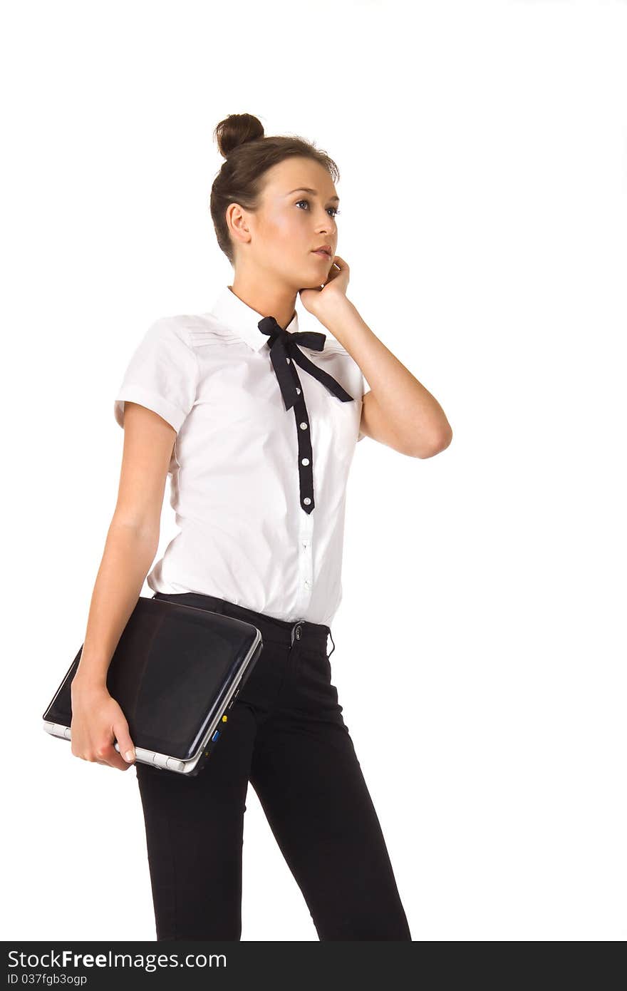 Woman standing and holding a laptop in hand on a white background, isolated picture