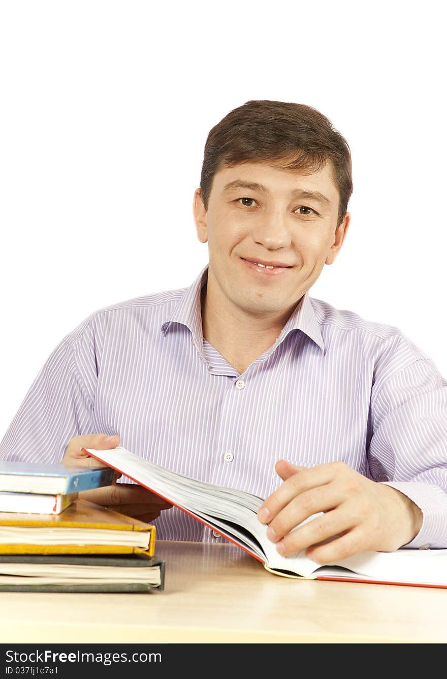 Young man c books on a table