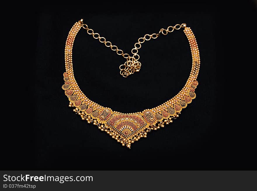 An authentic indian jewellery isolated on black background