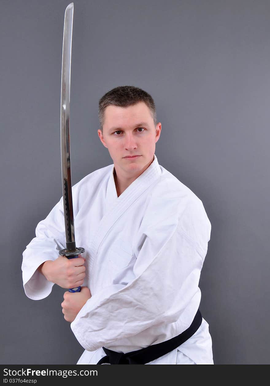 Karate man with single edged Japanese sword
