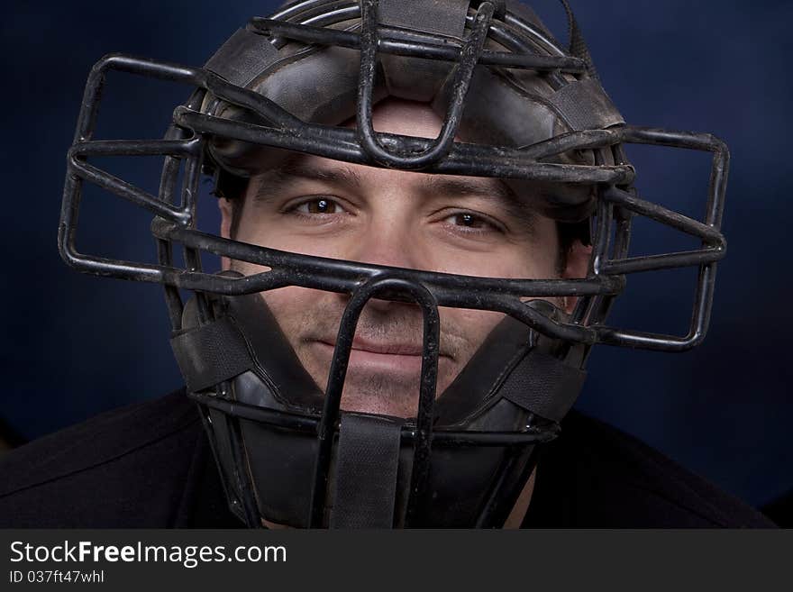 Man In A Catcher S Mask - Horizontal