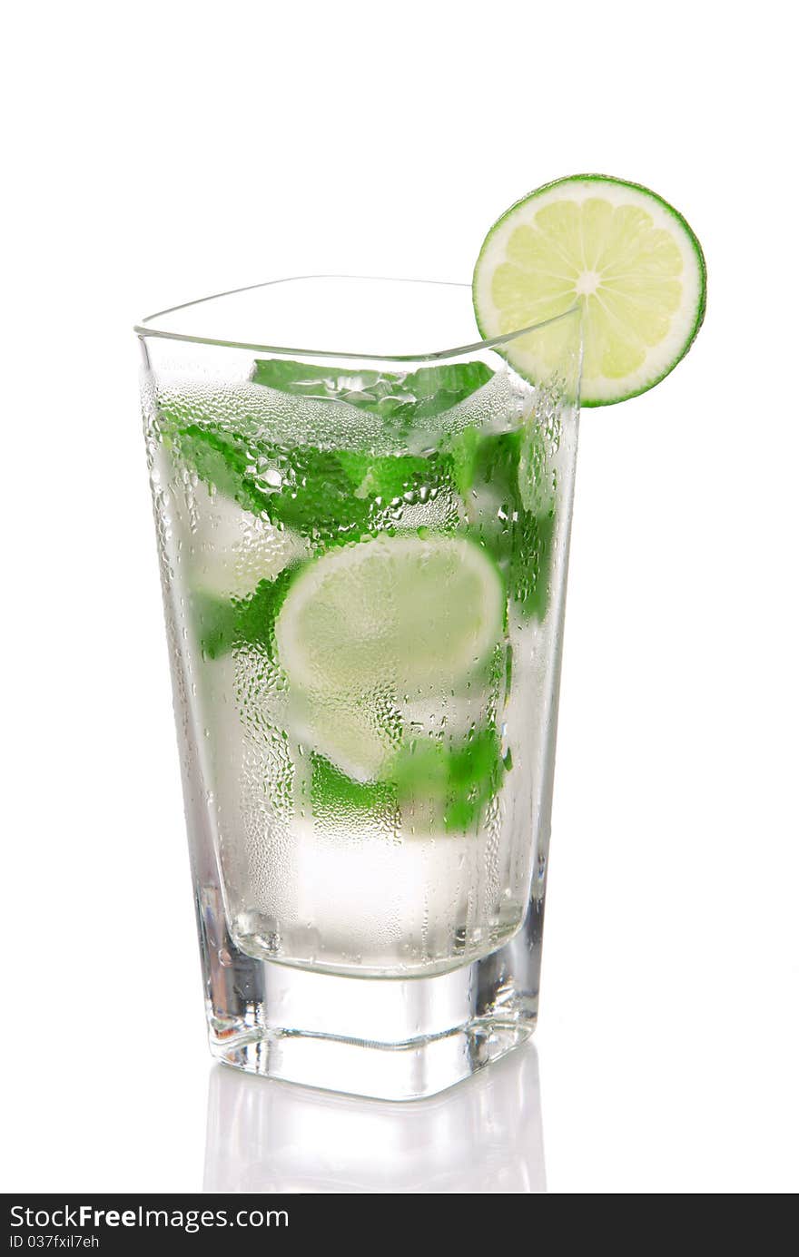 Classic Mojito Cocktail drink with light rum, lime, spring of mint, sprite soda and syrup in cocktails highball glass isolated on a white background