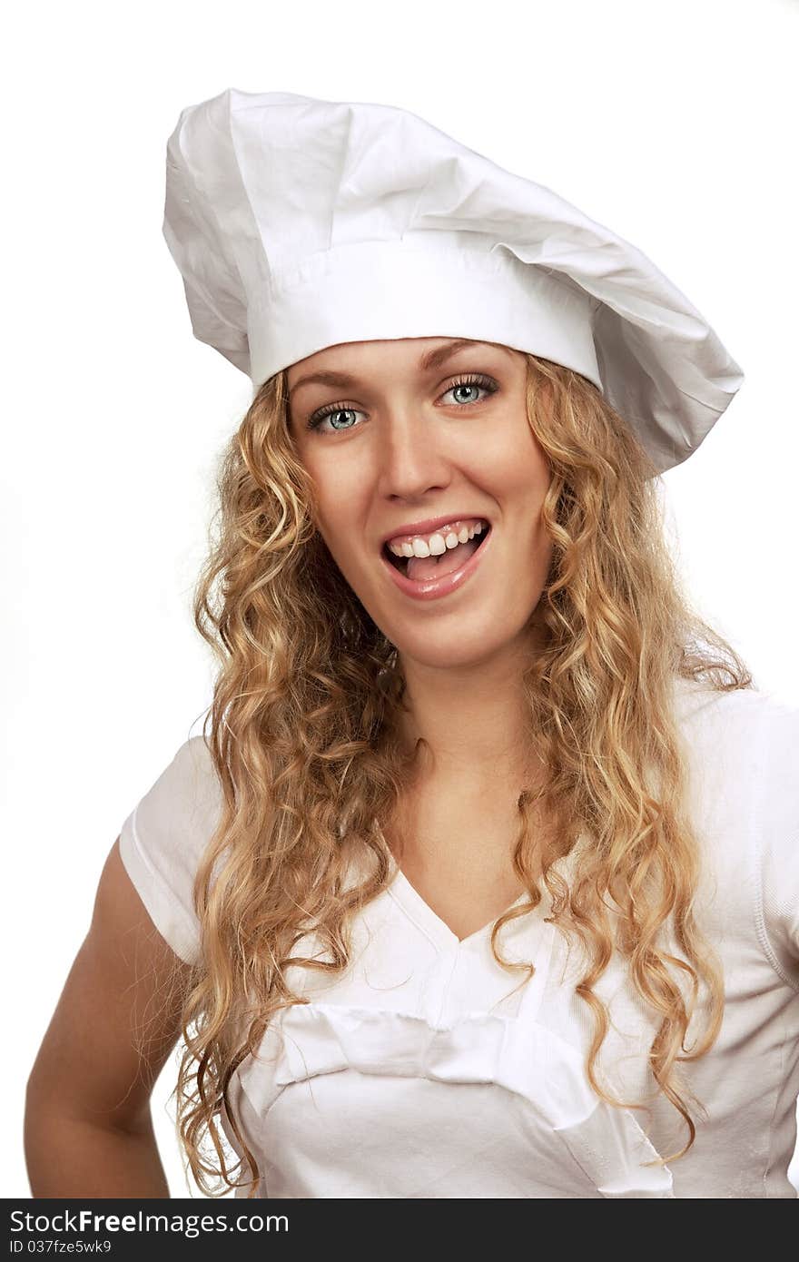 Young woman in white chef dress smiling. Young woman in white chef dress smiling