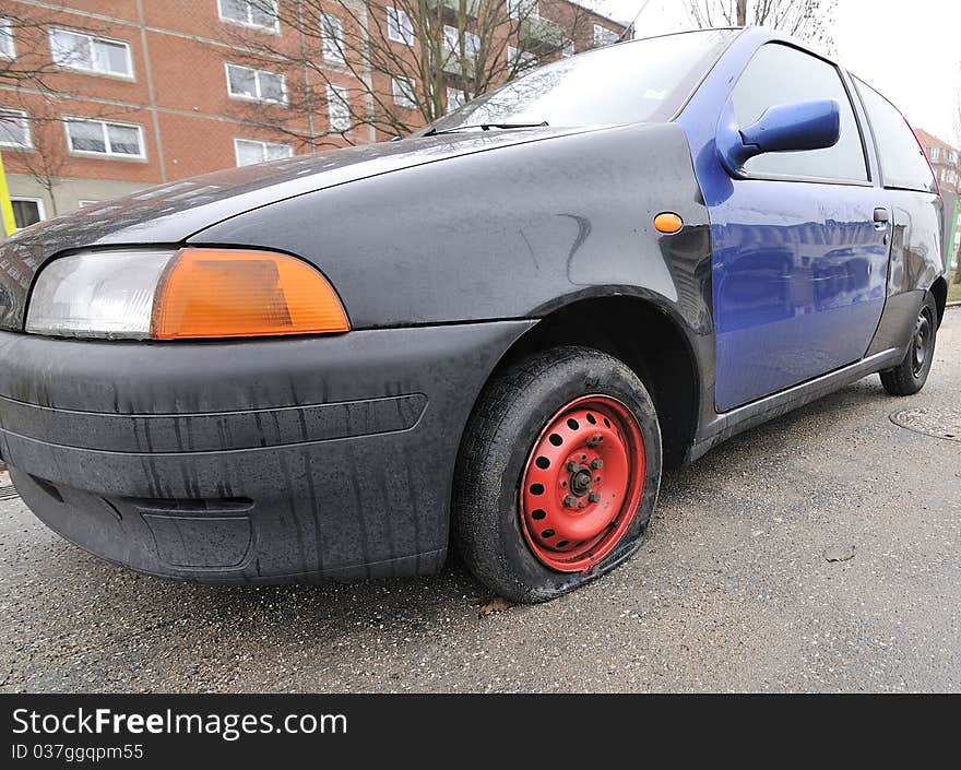 Car with flat tires on roadside. Car with flat tires on roadside