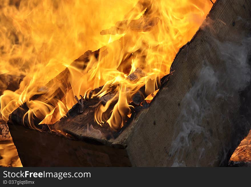 Wooden box is burning in fire. Wooden box is burning in fire