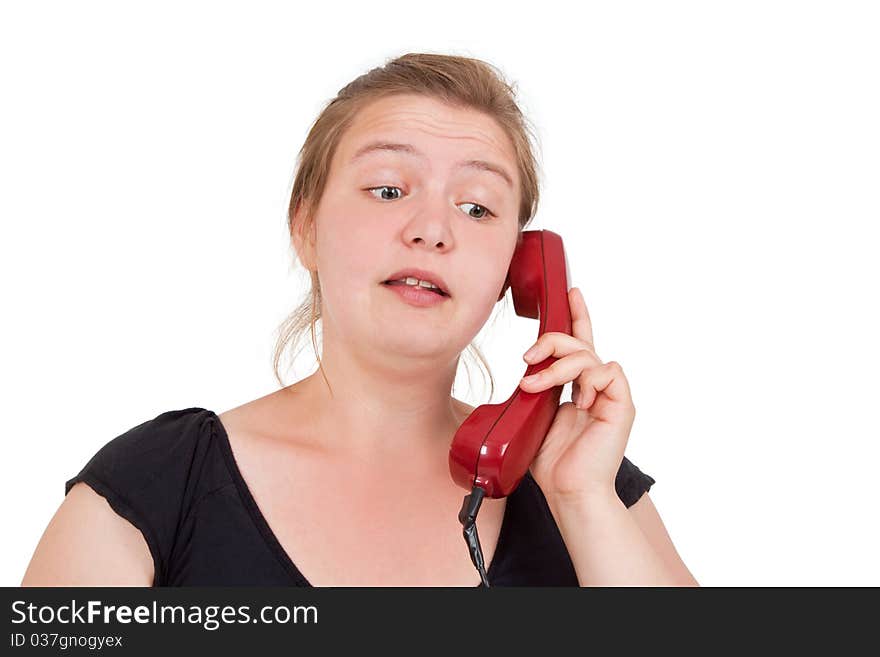 Young woman talking on the phone - isolated. Young woman talking on the phone - isolated