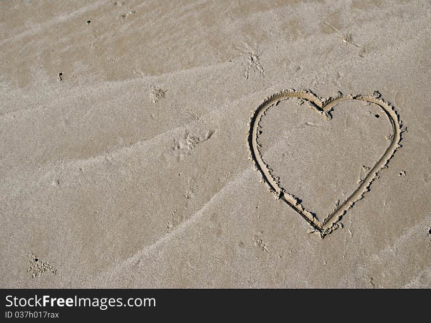 Love heart on the beach.