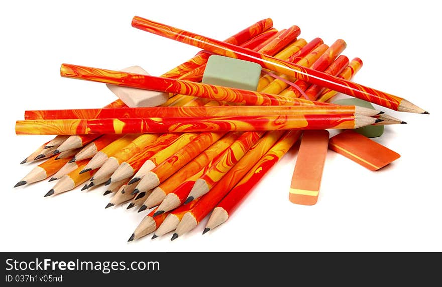 Rubbers and lead pencils isolated on a white background